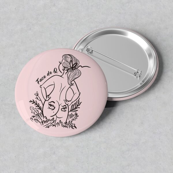 Gros badge "Face de Q"